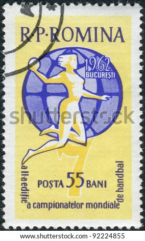 ROMANIA - CIRCA 1962: A stamp printed in the Romania, dedicated to the 2nd Women\'s Handball Championships, shows Handball Player on a globe, circa 1962