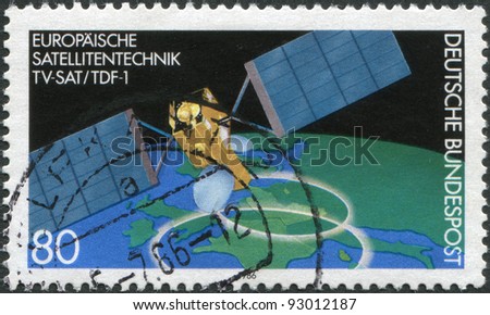 GERMANY - CIRCA 1986: A stamp printed in the Germany, dedicated to the European Satellite Technology, shows TV-SAT/TDF-1 over Europe, circa 1986