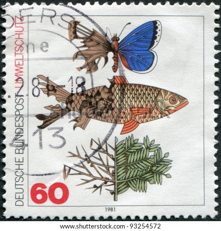 GERMANY - CIRCA 1981: A stamp printed in Germany, is dedicated to protecting the environment, shows a butterfly, fish, and a branch with injuries from a bad environment, circa 1981