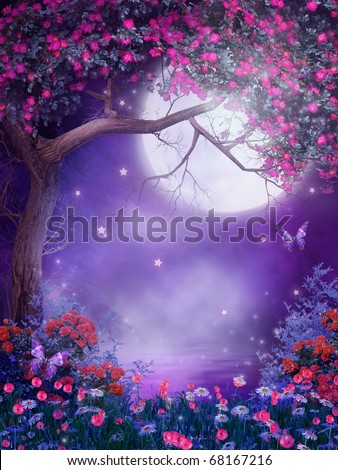 stock photo Purple scenery with a flowering tree and colorful shrubs