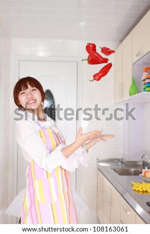 A girl throw away cayenne in kitchen