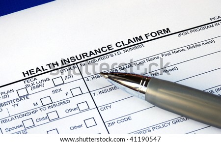 Filling the health insurance  claim form isolated in blue