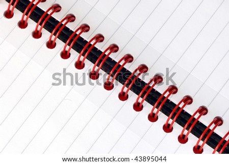 A fragment of the spiral note pad