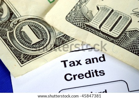 Getting refund from the income tax return isolated on blue