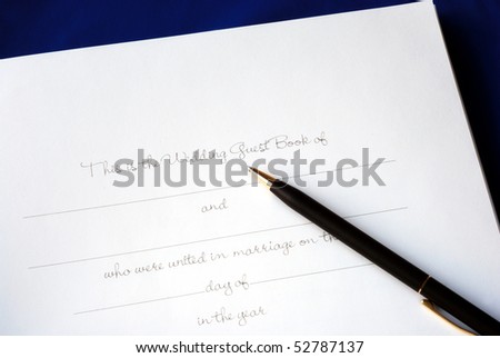 The first page of a wedding guest book isolated on blue