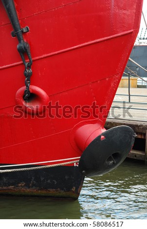 Front view of a red ship