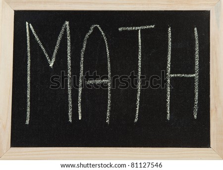 A black board with a wooden frame and the word \'MATH\' written in chalk.