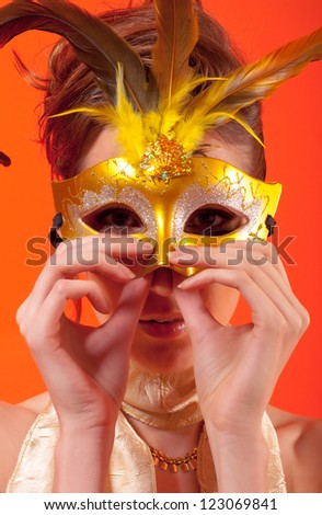 Portrait of masked lady on masquerade ball.