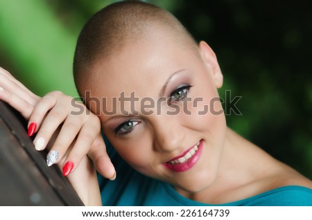 Happy and young cancer survivor after successful chemotherapy.