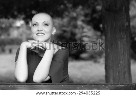 Happy and young cancer survivor after successful chemotherapy.