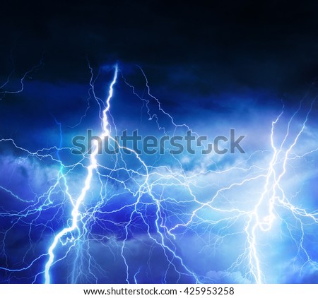 Lightnings, thunder and rain during summer storm.
