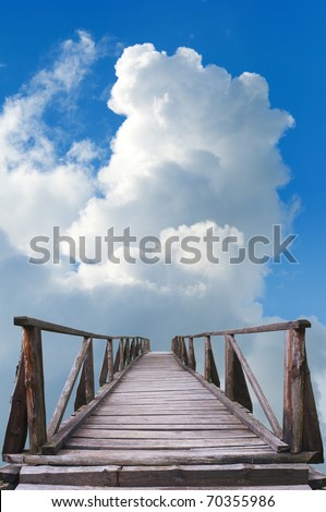 Old wooden bridge leads to the unknown.