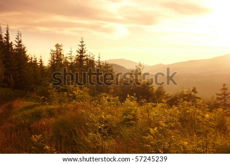 Landscape Beskydy Mountains on the border of Czech Republic and Slovakia in the setting sun