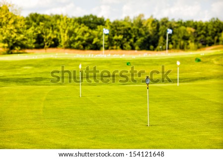 Golf Club field at sunny day
