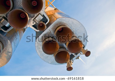 Nozzles space rocket Soyuz. Close-up on a background of clear blue sky.