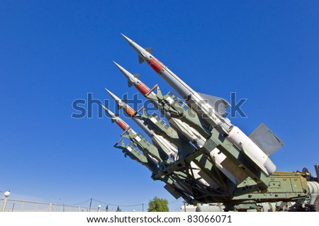 Antiaircraft rockets on the launcher against blue sky.