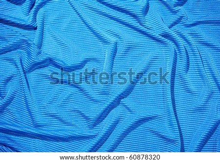 Blue rippled cloth as background