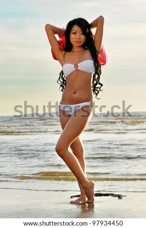 Sexy asian woman in white bikini