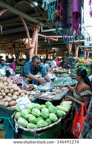 Flacq, Mauritius-June 23: Indian People Search For A Bargains In The Market Hall On June 23, 2013 In Flacq, Mauritius