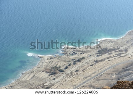 Aerial view of Dead Sea coast from Judea desert mountains, Israel.