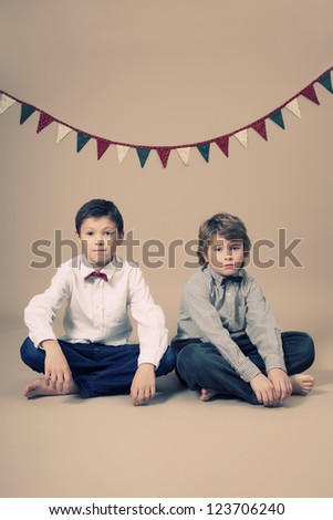 Brothers with bow tie during Christmas
