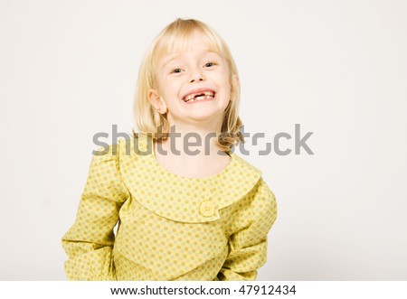 Girl with missing teeth