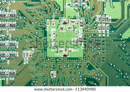 A close up of a green computer circuit.