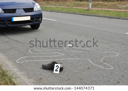Body of a man on the street  hit by the car