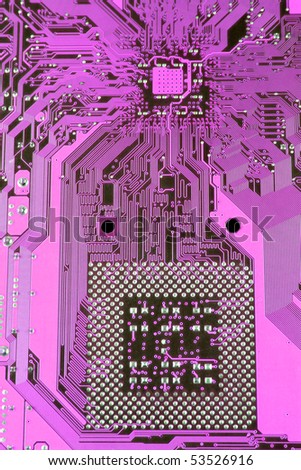 Closeup of a pink computer circuit board