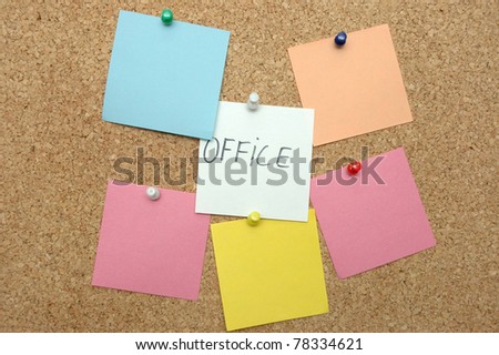 Blank color papers pinned on notice board ready for write down information . In office