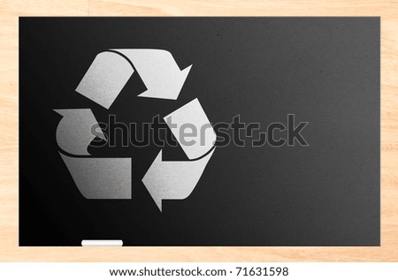 Blackboard with the recycling sign inside and wooden frame and white chalk. Illustration