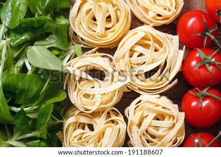 Italian flag of greens, pasta and tomatoes