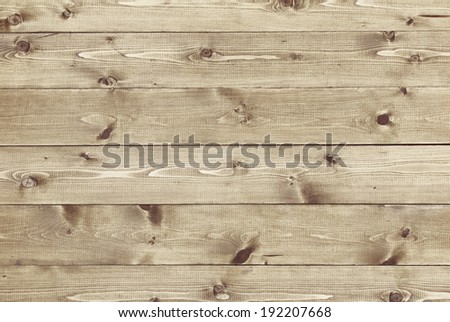 Architectural background texture of a panel of natural unpainted pine board cladding with knots and wood grain in a parallel pattern conceptual of woodwork, carpentry, joinery and construction