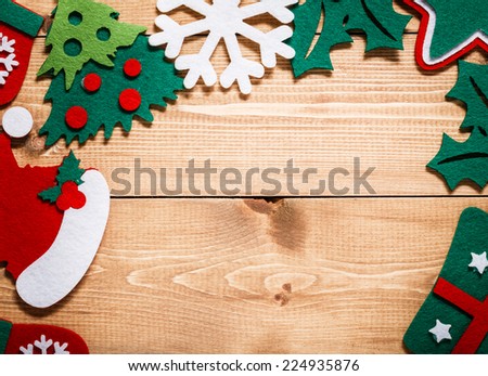 Christmas and New Year decorations on wooden background of aged boards.