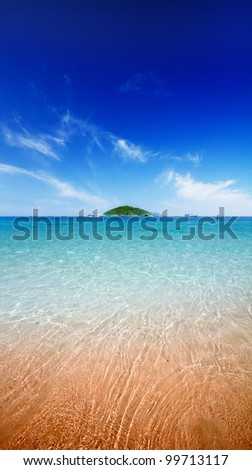 Beach with blue water and clean sand