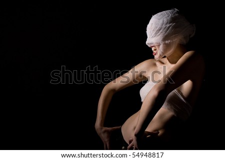 Woman wrapped in bandages