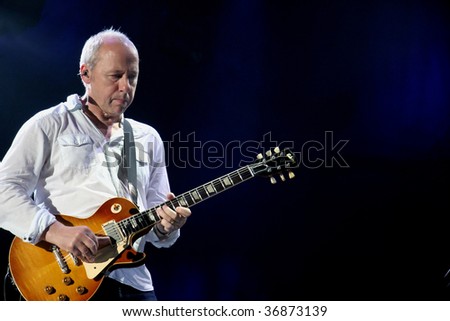 AMSTERDAM - March 29: Mark Knopfler performance a live concert with Emmylou Harris at the Heineken Music Hall Amsterdam, March 29, 2006 in Amsterdam, Netherlands