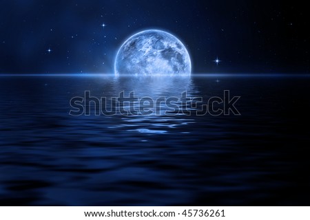 Rising moon over sea