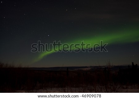 The northern lights produced bands of green filled the sky on January 3rd, 2010 outside of Fairbanks, AK.
