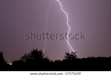 Three lightning strikes occur at the same time hitting Springdale, AR.