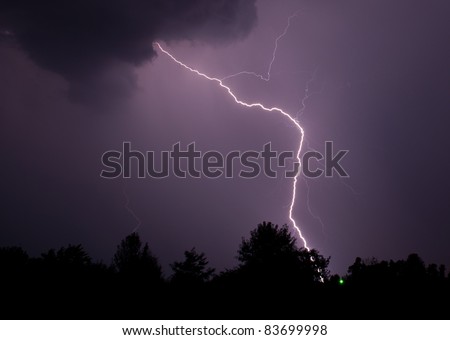 A lightning strike seeks out it target a few milliseconds after leaving the cloud. Picture was taken on August 29, 2011.