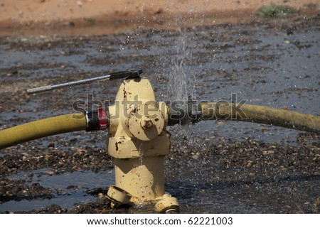 Water leaks from a fire hydrant.