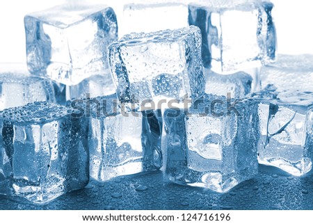 melting ice cubes on glass table