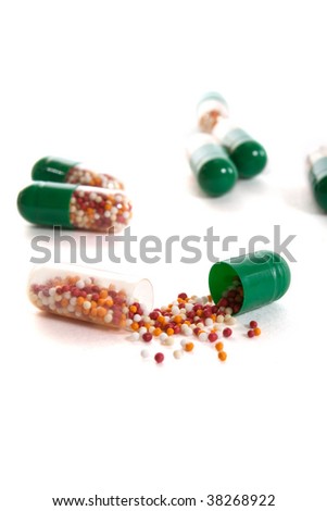 broken pill isolated on white background