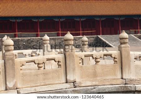 An ornate carved stone wall in the Forbidden City, Beijing, China