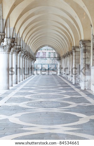 A row of arches underneath the Doge's Palace in Piazza San Marco in Venice.