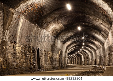 A curved tunnel in the Peak District in Derbyshire.  Originally a Victorian railway tunnel it is now part of a public footpath.