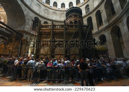 Jerusalem, Israel - November 9, 2014 : Visitors at the Church of the holy Sepulcher, known as The most important site christians for containing the place where Jesus is said to have been buried.