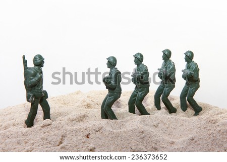 Plastic toy Soldiers with sand