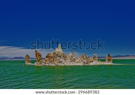 Isle with nature sculptures on Mono Lake Nature Park in California, USA